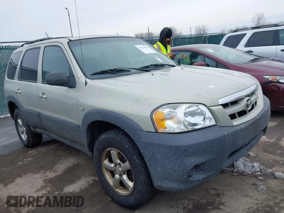 2005 Mazda Tribute i with VIN 4F2YZ02Z35KM57658, listed as a IAAI auction lot 41547562 with 131,303 mi miles and . Bid and sale history available at carsss.com. Image 1.