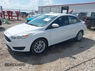 2015 Ford Focus SE with VIN 1FADP3F2XFL335884, listed as a IAAI auction lot 42582740 with 102,036 mi miles and . Bid and sale history available at DreamBid. Image 17.