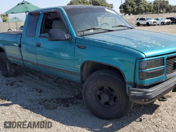 1995 GMC Sierra 1500 with VIN 1GTGC29N5SE541812, listed as a Copart auction lot 72408103 with 193,899 mi miles and Salvage Title. Bid and sale history available at DreamBid. Image 4.