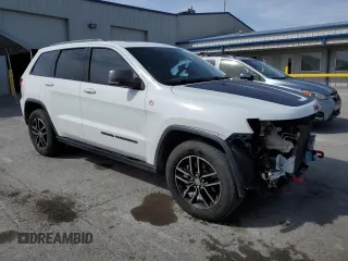 2017 Jeep Grand Cherokee Trailhawk with VIN 1C4RJFLT1HC729163, listed as a Copart auction lot 51115745 with 213,292 mi miles and Salvage title. Bid and sale history available at DreamBid. Image 4.