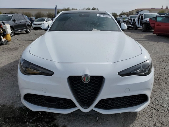 2022 Alfa Romeo Giulia with VIN ZARFAMAN2N7656343, listed as a Copart auction lot 49706275 with 63,524 mi miles and Salvage title. Bid and sale history available at DreamBid. Image 5.