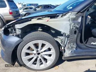 2022 Tesla Model 3 with VIN 5YJ3E1EA8NF241691, listed as a IAAI auction lot 41742584 with 70,375 mi miles and . Bid and sale history available at DreamBid. Image 6.