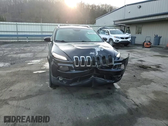 2015 Jeep Cherokee Latitude with VIN 1C4PJMCBXFW694086, listed as a Copart auction lot 49604405 with 119,743 mi miles and Salvage Title. Bid and sale history available at carsss.com. Image 14.