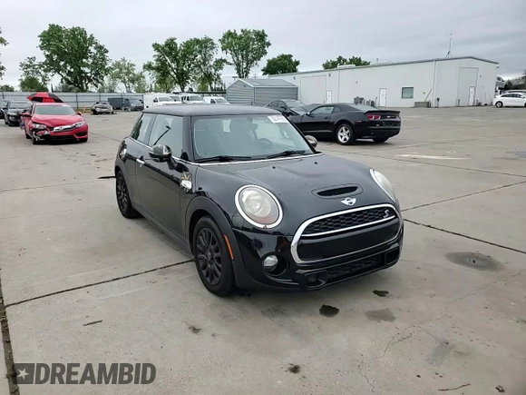 2014 MINI Hardtop S with VIN WMWXM7C57ET987069, listed as a Copart auction lot 52147955 with 121,276 mi miles and Salvage Title. Bid and sale history available at DreamBid. Image 10.