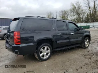 2011 Chevrolet Suburban LT z VIN 1GNSKJE37BR272949, wystawiony jako Copart lot #55329935 z przebiegiem 211 997 mil mil oraz Nie do naprawy • Non repairable. Historia ofert i sprzedaży dostępna na DreamBid. Obrazek 3.