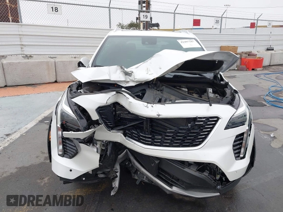 2022 Cadillac XT4 FWD Premium Luxury with VIN 1GYFZCR49NF100393, listed as a IAAI auction lot 42497187 with 23,672 mi miles and . Bid and sale history available at DreamBid. Image 12.