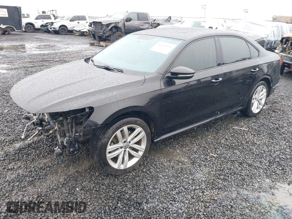 2019 Volkswagen Passat 2.0T Wolfsburg Edition with VIN 1VWLA7A39KC011539, listed as a IAAI auction lot 41616136 with 54,652 mi miles. Bid and sale history available at carsss.com. Image 18.