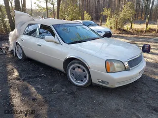 2002 Cadillac DeVille DHS with VIN 1G6KE57Y42U216449, listed as a IAAI auction lot 41611917 with 73,054 mi miles. Bid and sale history available at carsss.com. Image 1.