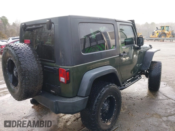 2009 Jeep Wrangler Rubicon z VIN 1J8GA64169L743008, wystawiony jako IAAI lot #41792451 z przebiegiem 142 414 mil mil oraz . Historia ofert i sprzedaży dostępna na DreamBid. Obrazek 4.