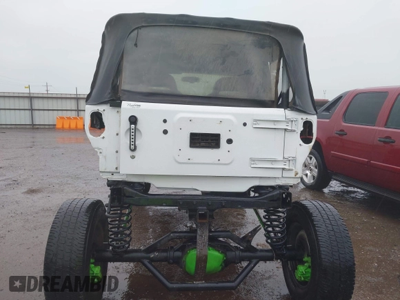 2013 Jeep Wrangler Sport with VIN 1C4AJWAG8DL601399, listed as a IAAI auction lot 42186399 with 130,195 mi miles and . Bid and sale history available at DreamBid. Image 17.