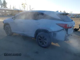 2018 Lexus RX 350L Premium z VIN JTJDZKCAXJ2008164, wystawiony jako IAAI lot #41436168 z przebiegiem 126 798 mil mil oraz . Historia ofert i sprzedaży dostępna na DreamBid. Obrazek 3.