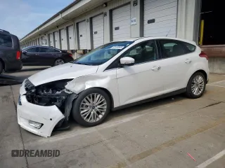 2017 Ford Focus Titanium z VIN 1FADP3N24HL206365, wystawiony jako Copart lot #63199965 z przebiegiem 51 435 mil mil oraz Szkoda całkowita • Salvage title. Historia ofert i sprzedaży dostępna na DreamBid. Obrazek 1.