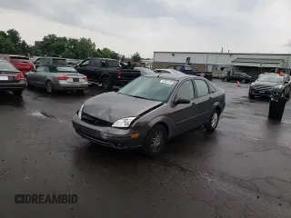 2007 Ford Focus S z VIN 1FAHP34N07W177912, wystawiony jako Copart lot #60481025 z przebiegiem 114 086 mil mil oraz Szkoda całkowita • Salvage title. Historia ofert i sprzedaży dostępna na DreamBid. Obrazek 14.
