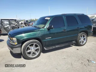 2003 Chevrolet Tahoe LS with VIN 1GNEC13V23J296834, listed as a Copart auction lot 58013825 with Not provided miles and Salvage title. Bid and sale history available at DreamBid. Image 1.