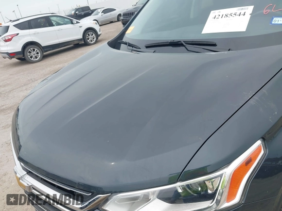 2021 Chevrolet Traverse LT with VIN 1GNERHKW4MJ191814, listed as a IAAI auction lot 42185544 with 87,493 mi miles and . Bid and sale history available at DreamBid. Image 6.