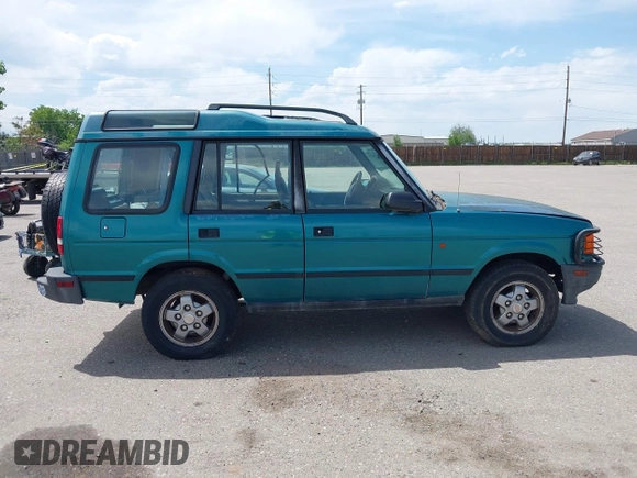 1994 Land Rover Discovery SD z VIN SALJY1247RA097510, wystawiony jako IAAI lot #42343474 z przebiegiem 137 141 mil mil oraz . Historia ofert i sprzedaży dostępna na DreamBid. Obrazek 13.