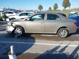 2009 Toyota Corolla with VIN 1NXBU40E59Z164488, listed as a IAAI auction lot 40907058 with 180,161 mi miles. Bid and sale history available at carsss.com. Image 14.