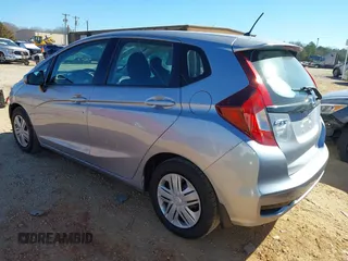 2018 Honda Fit LX with VIN 3HGGK5H43JM735424, listed as a IAAI auction lot 41381399 with 105,044 mi miles. Bid and sale history available at carsss.com. Image 3.
