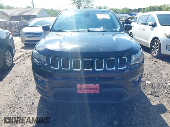 2020 Jeep Compass Latitude with VIN 3C4NJCBBXLT166004, listed as a IAAI auction lot 42025390 with 106,271 mi miles and . Bid and sale history available at carsss.com. Image 13.