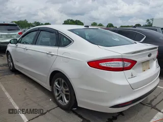 2016 Ford Fusion Titanium Hybrid with VIN 3FA6P0RU3GR190355, listed as a IAAI auction lot 42384309 with 157,172 mi miles and . Bid and sale history available at DreamBid. Image 3.