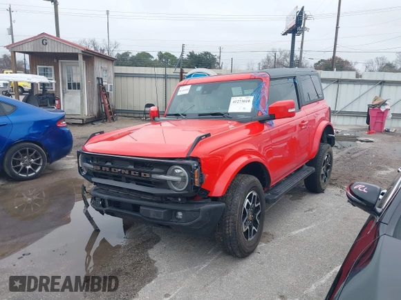 2023 Ford Bronco with VIN 1FMDE5CP3PLB32344, listed as a IAAI auction lot 41273010 with 25,220 mi miles. Bid and sale history available at carsss.com. Image 2.