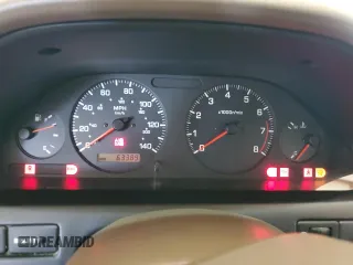 1999 Nissan Maxima GXE z VIN JN1CA21D0XT808755, wystawiony jako Copart lot #49693685 z przebiegiem 63 389 mil mil oraz Szkoda całkowita • Salvage title. Historia ofert i sprzedaży dostępna na DreamBid. Obrazek 9.