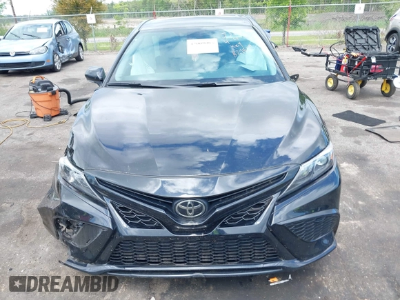 2023 Toyota Camry SE with VIN 4T1G11AK6PU829509, listed as a IAAI auction lot 42009085 with 35,864 mi miles and . Bid and sale history available at DreamBid. Image 12.