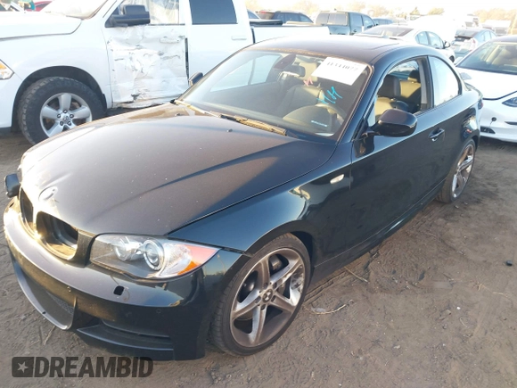2010 BMW 1 Series 135i with VIN WBAUC7C52AVK81261, listed as a IAAI auction lot 41344077 with 110,745 mi miles and . Bid and sale history available at carsss.com. Image 2.