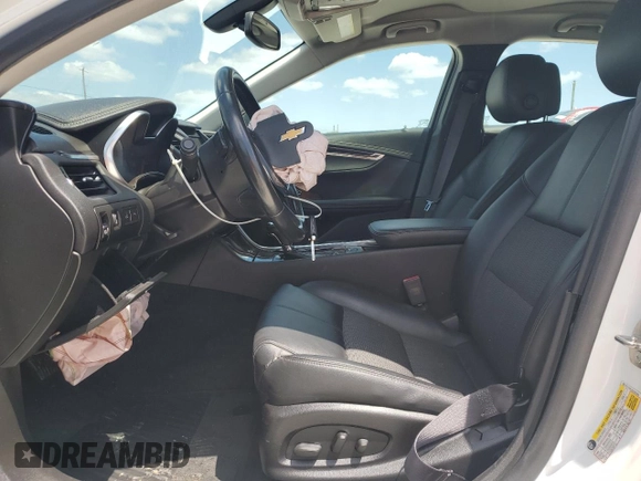 2014 Chevrolet Impala LT with VIN 2G1115SL4E9263359, listed as a Copart auction lot 52239775 with 135,437 mi miles and Salvage Title. Bid and sale history available at DreamBid. Image 7.