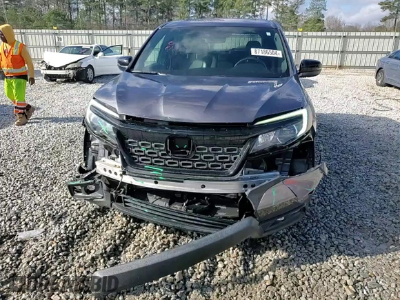2019 Honda Passport EX-L with VIN 5FNYF7H5XKB001901, listed as a Copart auction lot 87186504 with 93,540 mi miles and Salvage Title. Bid and sale history available at carsss.com. Image 14.