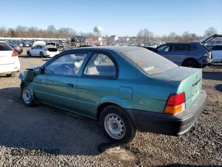1996 Toyota Tercel DX z VIN JT2AC52L6T0170537, wystawiony jako Copart lot #42576525 z przebiegiem 66 926 mil mil oraz Szkoda całkowita • Salvage title. Historia ofert i sprzedaży dostępna na DreamBid. Obrazek 2.