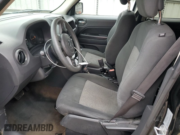 2017 Jeep Patriot Sport with VIN 1C4NJRBB1HD143808, listed as a Copart auction lot 58302235 with 136,123 mi miles and Salvage title. Bid and sale history available at DreamBid. Image 7.