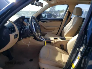 2013 BMW X1 xDrive28i with VIN WBAVL1C56DVR88434, listed as a Copart auction lot 52126925 with 136,187 mi miles and Salvage Title. Bid and sale history available at carsss.com. Image 7.