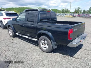 2000 Nissan Frontier XE with VIN 1N6ED27T3YC422325, listed as a IAAI auction lot 42268431 with 169,994 mi miles and . Bid and sale history available at DreamBid. Image 3.