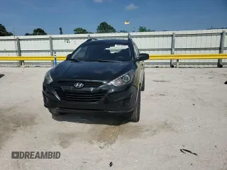 2010 Hyundai Tucson GLS with VIN KM8JU3AC2AU079129, listed as a Copart auction lot 54312875 with 116,659 mi miles and Salvage Title. Bid and sale history available at DreamBid. Image 14.