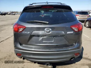 2014 Mazda CX-5 Touring with VIN JM3KE2CY7E0366690, listed as a Copart auction lot 50783635 with 127,853 mi miles and Salvage Title. Bid and sale history available at carsss.com. Image 6.
