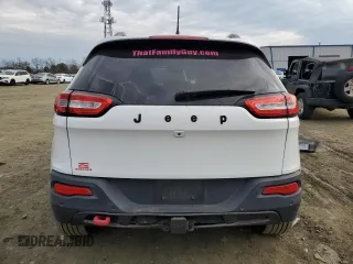 2015 Jeep Cherokee Trailhawk z VIN 1C4PJMBB1FW528766, wystawiony jako Copart lot #46879355 z przebiegiem 248 676 mil mil oraz Szkoda całkowita • Salvage title. Historia ofert i sprzedaży dostępna na DreamBid. Obrazek 6.