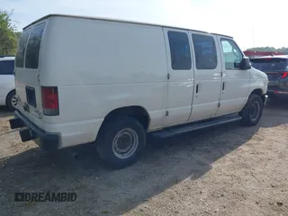 2009 Ford Econoline Cargo with VIN 1FTNE24W89DA31505, listed as a IAAI auction lot 42066233 with 267,327 mi miles. Bid and sale history available at carsss.com. Image 4.