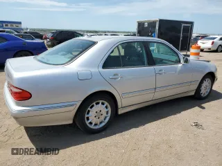 2002 Mercedes-Benz E-Class with VIN WDBJF82J92X065591, listed as a Copart auction lot 65841964 with 155,195 mi miles and Salvage Title. Bid and sale history available at carsss.com. Image 3.