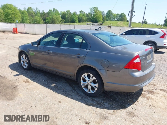 2012 Ford Fusion SE z VIN 3FAHP0HA4CR232641, wystawiony jako IAAI lot #42057070 z przebiegiem 180 793 mil mil oraz . Historia ofert i sprzedaży dostępna na DreamBid. Obrazek 3.
