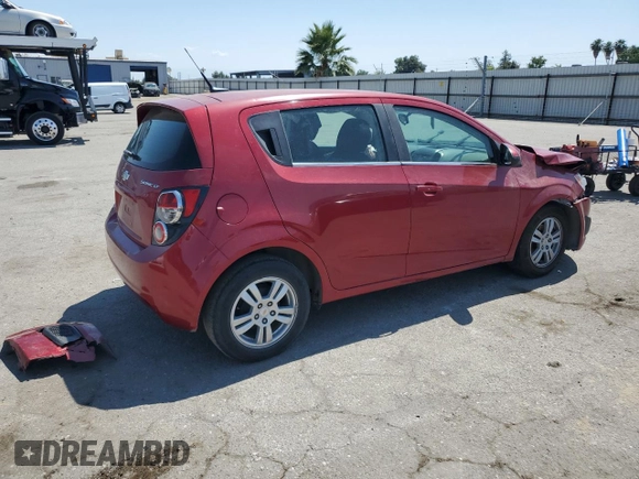2012 Chevrolet Sonic LT with VIN 1G1JC6SH9C4133623, listed as a Copart auction lot 60065525 with 141,930 mi miles and Salvage title. Bid and sale history available at DreamBid. Image 3.