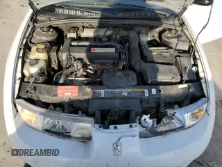 1999 Saturn SC with VIN 1G8ZR1275XZ375833, listed as a Copart auction lot 87960885 with 97,697 mi miles and Salvage Title. Bid and sale history available at carsss.com. Image 11.