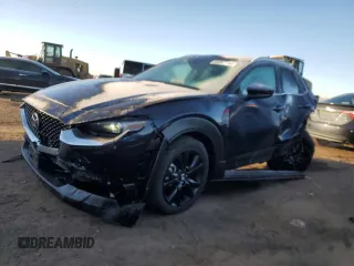 2023 Mazda CX-30 Premium with VIN 3MVDMBDY1PM569589, listed as a Copart auction lot 83267194 with 12,228 mi miles and Salvage title. Bid and sale history available at DreamBid. Image 1.