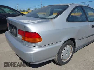 1997 Honda Civic DX with VIN 1HGEJ6220VL106203, listed as a IAAI auction lot 42098813 with 192,343 mi miles. Bid and sale history available at carsss.com. Image 6.
