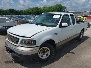 2002 Ford F-150 XL with VIN 1FTRX17W22NB88707, listed as a IAAI auction lot 42687327 with 185,481 mi miles and . Bid and sale history available at DreamBid. Image 2.