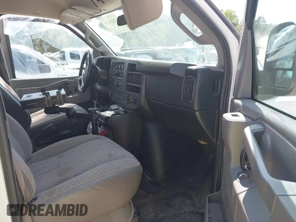 2016 Chevrolet Express Cargo with VIN 1GCWGBFF9G1287632, listed as a IAAI auction lot 42621435 with 61,701 mi miles and . Bid and sale history available at DreamBid. Image 5.
