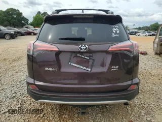2016 Toyota RAV4 XLE with VIN 2T3RFREV9GW516247, listed as a Copart auction lot 56342505 with 105,718 mi miles and Salvage title. Bid and sale history available at DreamBid. Image 6.
