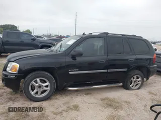 2006 GMC Envoy SLT with VIN 1GKDS13S462241866, listed as a IAAI auction lot 41943322 with 90,695 mi miles. Bid and sale history available at carsss.com. Image 14.