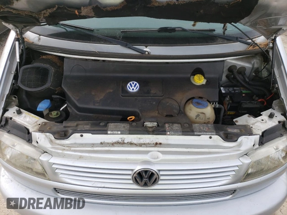 2002 Volkswagen EuroVan MV с VIN WV2NB47052H015757, выставлен на аукционе Copart как лот 81666434 с пробегом 191 543 миль миль и Чистый • Clean title. История ставок и продаж доступна на DreamBid. Изображение 12.