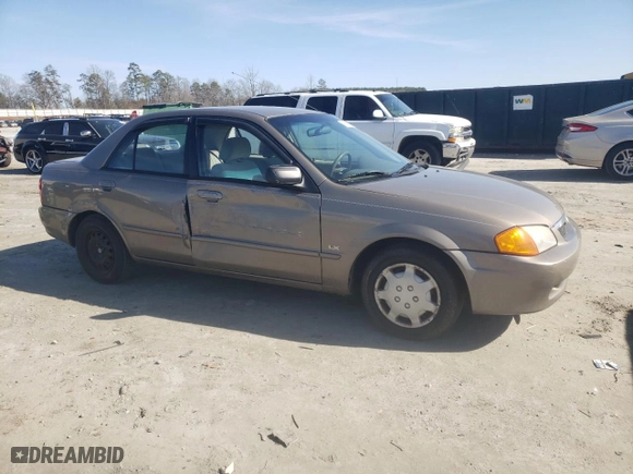 2000 Mazda Protege DX with VIN JM1BJ2227Y0247785, listed as a Copart auction lot 43501105 with 214,380 mi miles and Salvage Title. Bid and sale history available at carsss.com. Image 4.